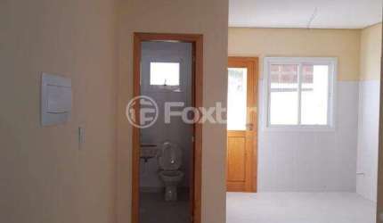 Casa com 3 quartos à venda na Rua Itacyr Rossi, 195, Guarujá, Porto Alegre, 126 m2 por R$ 500.000