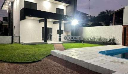 Casa em condomínio fechado com 3 quartos à venda na Rua Cipreste, 348, São Lucas, Viamão, 240 m2 por R$ 1.000.000
