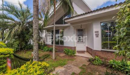Casa em condomínio fechado com 4 quartos à venda na Rodovia Tapir Rocha, 6614, São Lucas, Viamão, 300 m2 por R$ 921.500