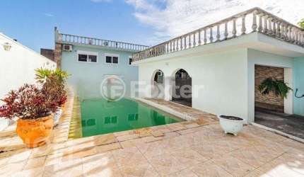 Casa com 4 quartos à venda na Rua Miracema, 134, Chácara das Pedras, Porto Alegre, 280 m2 por R$ 845.750