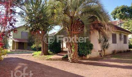 Casa com 3 quartos à venda na Travessa Escobar, 430, Camaquã, Porto Alegre, 310 m2 por R$ 1.100.000