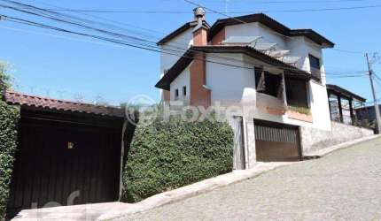 Casa com 3 quartos à venda na Rua Sarmento Leite, 2701, Exposição, Caxias do Sul, 239 m2 por R$ 1.100.000