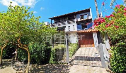 Casa com 4 quartos à venda na Rua Dona Lida Monteiro, 140, Teresópolis, Porto Alegre, 195 m2 por R$ 1.220.000
