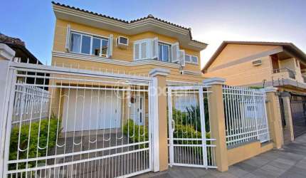 Casa com 4 quartos à venda na Rua Itaboraí, 1009, Jardim Botânico, Porto Alegre, 355 m2 por R$ 2.800.000