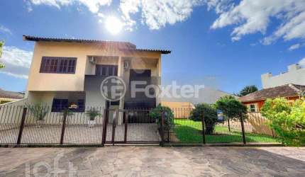 Casa com 3 quartos à venda na Rua João Aluysio Jacob, 381, Fátima, Canoas, 200 m2 por R$ 850.000