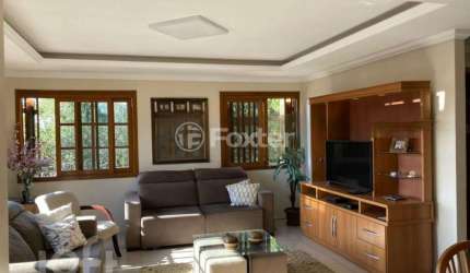 Casa com 4 quartos à venda na Rua Dolores Duran, 2306, Lomba do Pinheiro, Porto Alegre, 234 m2 por R$ 640.000