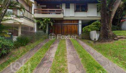 Casa com 4 quartos à venda na Rua Carlos Trein Filho, 1255, Auxiliadora, Porto Alegre, 440 m2 por R$ 3.990.000