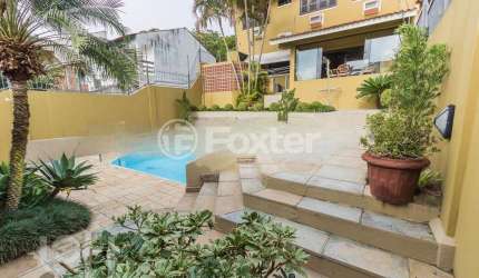Casa com 4 quartos à venda na Rua Lloyd de Andrade Polidoro, 90, Ipanema, Porto Alegre, 287 m2 por R$ 1.590.000