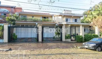 Casa com 5 quartos à venda na Rua Canto e Melo, 84, Nonoai, Porto Alegre, 420 m2 por R$ 960.000