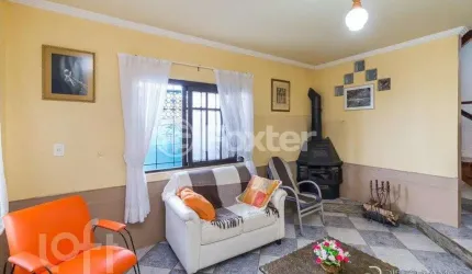 Casa com 3 quartos à venda na Rua Ângelo Passuelo, 420, Vila Nova, Porto Alegre, 296 m2 por R$ 499.000