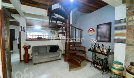 Casa com 4 quartos à venda na Rua Agulhas Negras, 41, Coronel Aparício Borges, Porto Alegre, 295 m2 por R$ 550.000