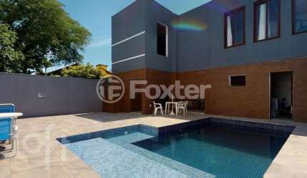Casa com 4 quartos à venda na Rua Jacundá, 132, Guarujá, Porto Alegre, 240 m2 por R$ 1.700.000