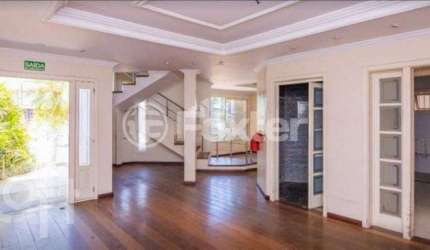 Casa com 3 quartos à venda na Avenida Doutor Sezefredo Azambuja Vieira, 156, Marechal Rondon, Canoas, 438 m2 por R$ 1.840.000