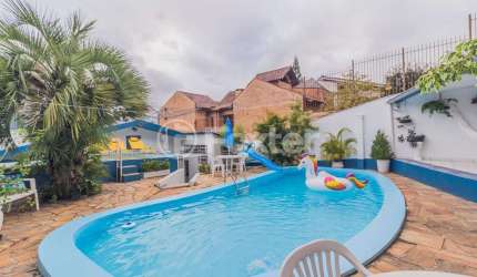 Casa com 4 quartos à venda na Rua Santo Camaratta-Santino, 6, Parque Santa Fé, Porto Alegre, 176 m2 por R$ 742.000