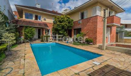 Casa com 5 quartos à venda na Rua Dona Lida Monteiro, 80, Teresópolis, Porto Alegre, 445 m2 por R$ 1.500.000