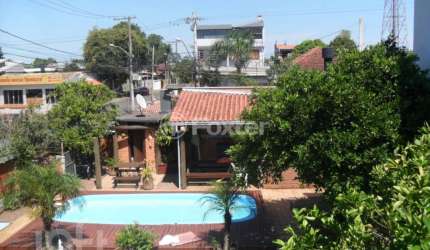 Casa com 3 quartos à venda na Rua Capiberibe, 318, Igara, Canoas, 256 m2 por R$ 1.275.000