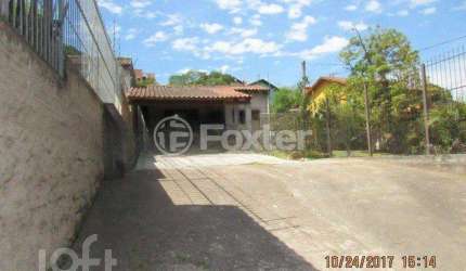 Casa com 3 quartos à venda na Avenida Vicente Monteggia, 2406, Cavalhada, Porto Alegre, 156 m2 por R$ 600.000
