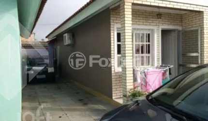 Casa em condomínio fechado com 2 quartos à venda na Rua Engenheiro Kindler, 1320, Harmonia, Canoas, 57 m2 por R$ 270.000
