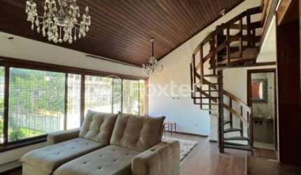 Casa com 3 quartos à venda na Rua Antônio Ribeiro, 321, Santo Antônio, Porto Alegre, 231 m2 por R$ 600.000