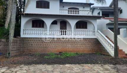 Casa em condomínio fechado com 3 quartos à venda na Avenida Senador Salgado Filho, 6863, São Lucas, Viamão, 300 m2 por R$ 1.000.000