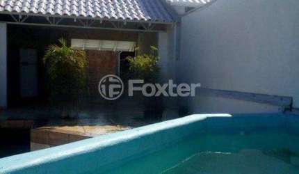 Casa com 3 quartos à venda na Rua Marco Aurélio Hidalgo, 17, Nossa Senhora das Graças, Canoas, 173 m2 por R$ 790.000