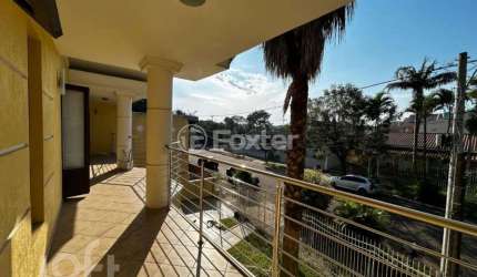 Casa com 3 quartos à venda na Rua dos Jacarandás, 133, Igara, Canoas, 300 m2 por R$ 1.490.000