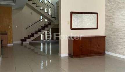 Casa com 4 quartos à venda na Avenida Fábio Araújo Santos, 1164, Nonoai, Porto Alegre, 329 m2 por R$ 1.138.100
