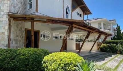 Casa em condomínio fechado com 4 quartos à venda na Rodovia Doutor Antônio Luiz Moura Gonzaga, 3801, Rio Tavares, Florianópolis, 450 m2 por R$ 4.900.000