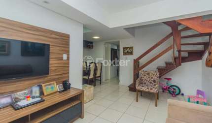 Casa em condomínio fechado com 3 quartos à venda na Rua São Sebastião do Cai, 119, Camaquã, Porto Alegre, 118 m2 por R$ 410.000