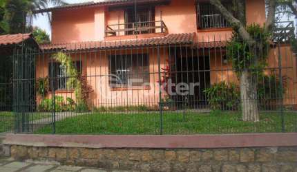 Casa com 5 quartos à venda na Rua Itapitocaí, 725, Cristal, Porto Alegre, 225 m2 por R$ 1.590.000