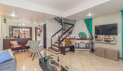 Casa com 3 quartos à venda na Rua Doutor Egydio Michaelsen, 62, Cavalhada, Porto Alegre, 197 m2 por R$ 700.000