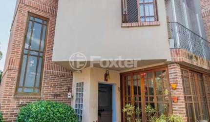 Casa em condomínio fechado com 3 quartos à venda na Rua João Mendes Ouriques, 570, Jardim Isabel, Porto Alegre, 166 m2 por R$ 690.000