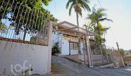 Casa com 4 quartos à venda na Rua João Bonuma, 110, Coronel Aparício Borges, Porto Alegre, 483 m2 por R$ 889.000