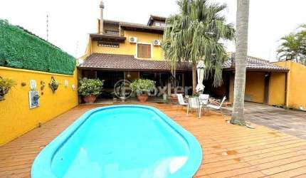 Casa com 3 quartos à venda na Avenida Orleaes, 492, Guarujá, Porto Alegre, 327 m2 por R$ 1.980.000