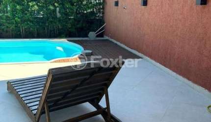 Casa com 3 quartos à venda na Rua Tucumã, 379, Enseada de Brito, Palhoça, 360 m2 por R$ 795.000