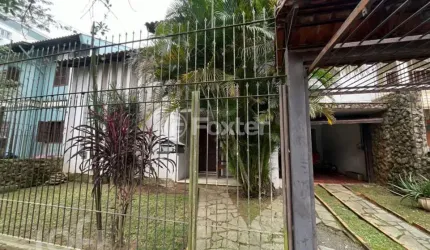 Casa com 4 quartos à venda na Rua São Caetano, 101, Marechal Rondon, Canoas, 360 m2 por R$ 1.000.000
