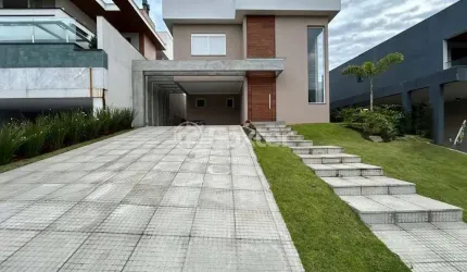 Casa em condomínio fechado com 3 quartos à venda na Avenida Senador Salgado Filho, 8500, Querência, Viamão, 399 m2 por R$ 1.350.000
