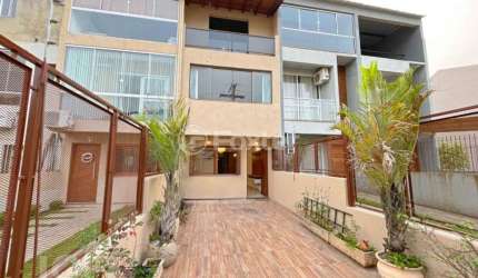 Casa com 2 quartos à venda na Rua Irmão Jaime Biazus, 211, Guarujá, Porto Alegre, 116 m2 por R$ 460.000