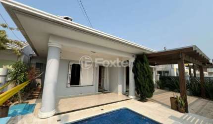 Casa com 3 quartos à venda na Avenida Flávio Boianovski, 918, Centro, Capão da Canoa, 172 m2 por R$ 1.280.000