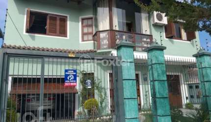 Casa com 5 quartos à venda na Rua Doutor Telmo Vergara, 554, Partenon, Porto Alegre, 331 m2 por R$ 1.199.000