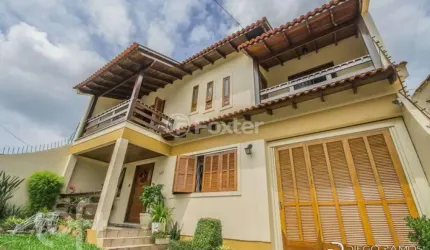 Casa com 5 quartos à venda na Avenida José Corrêa da Silva, 117, Cavalhada, Porto Alegre, 316 m2 por R$ 720.000