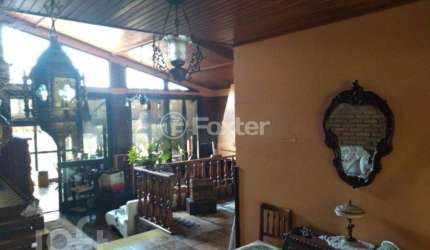 Casa com 3 quartos à venda na Avenida Martim Félix Berta, 2960, Mário Quintana, Porto Alegre, 163 m2 por R$ 790.000