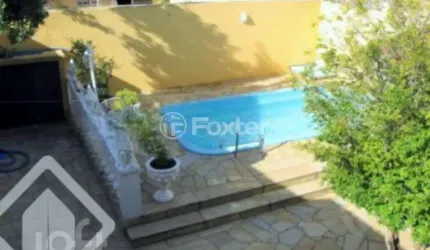 Casa com 3 quartos à venda na Rua Olécio Cavedini, 165, Espírito Santo, Porto Alegre, 200 m2 por R$ 800.000