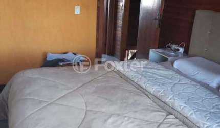 Casa com 3 quartos à venda na Rua Tres Marias, 215, Arco Íris, Capão da Canoa, 160 m2 por R$ 1.100.000