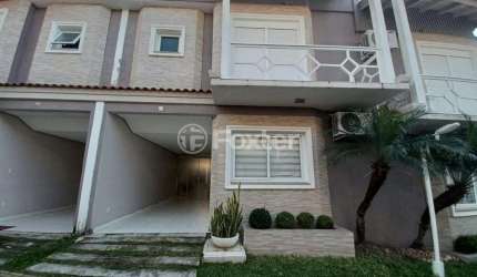 Casa em condomínio fechado com 3 quartos à venda na Rua Tenente Antônio João, 845, Estância Velha, Canoas, 143 m2 por R$ 700.000