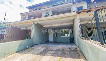 Casa com 3 quartos à venda na Rua Claudio da Silva Pinto, 484, Espírito Santo, Porto Alegre, 176 m2 por R$ 654.550