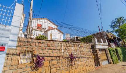 Casa com 3 quartos à venda na Avenida Nonoai, 1566, Nonoai, Porto Alegre, 319 m2 por R$ 750.000