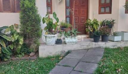 Casa com 2 quartos à venda na Rua Germano Petersen Júnior, 458, Auxiliadora, Porto Alegre, 120 m2 por R$ 1.500.000