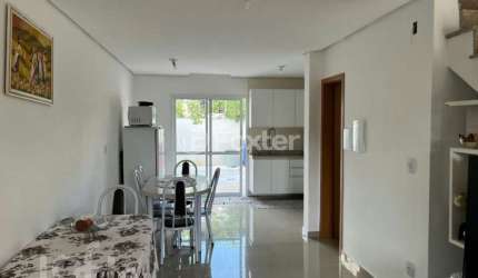 Casa com 3 quartos à venda na Rua Vanderlei da Silva Alves, 470, Mário Quintana, Porto Alegre, 104 m2 por R$ 550.000