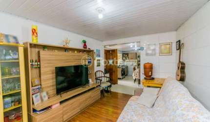 Casa com 2 quartos à venda na Rua Nilo Torres, 146, Coronel Aparício Borges, Porto Alegre, 100 m2 por R$ 218.500
